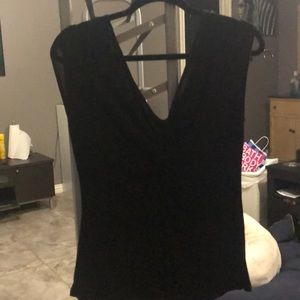 Black blouse. Red sparkles.